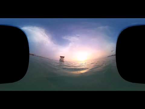 sunset aruba with boat