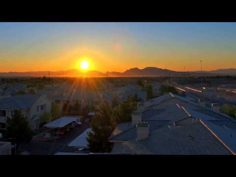 Sunrise Time Lapse HD Video 1080p Footage Views of Rising Sun over a City with Houses and Traffic