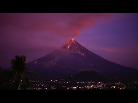 Philippines: Timelapse of Mayon volcano erupting during sunrise