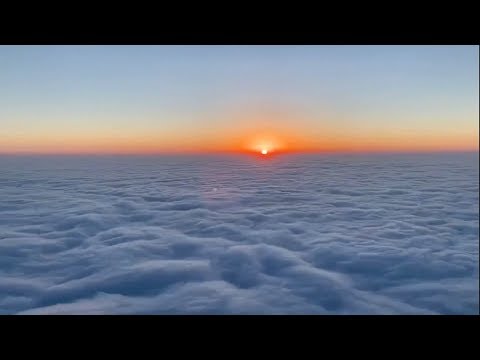 Gorgeous time lapse shows sunrise over clouds roiling like waves in China