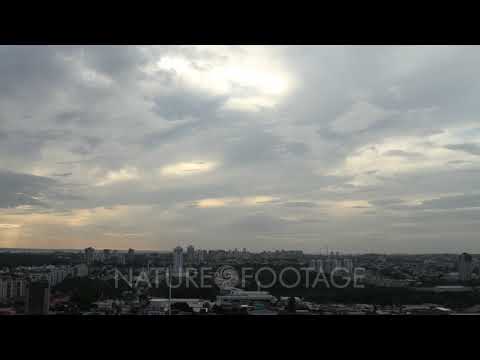 Time Lapse, Clouds Move Above City of Manaus at Sunset